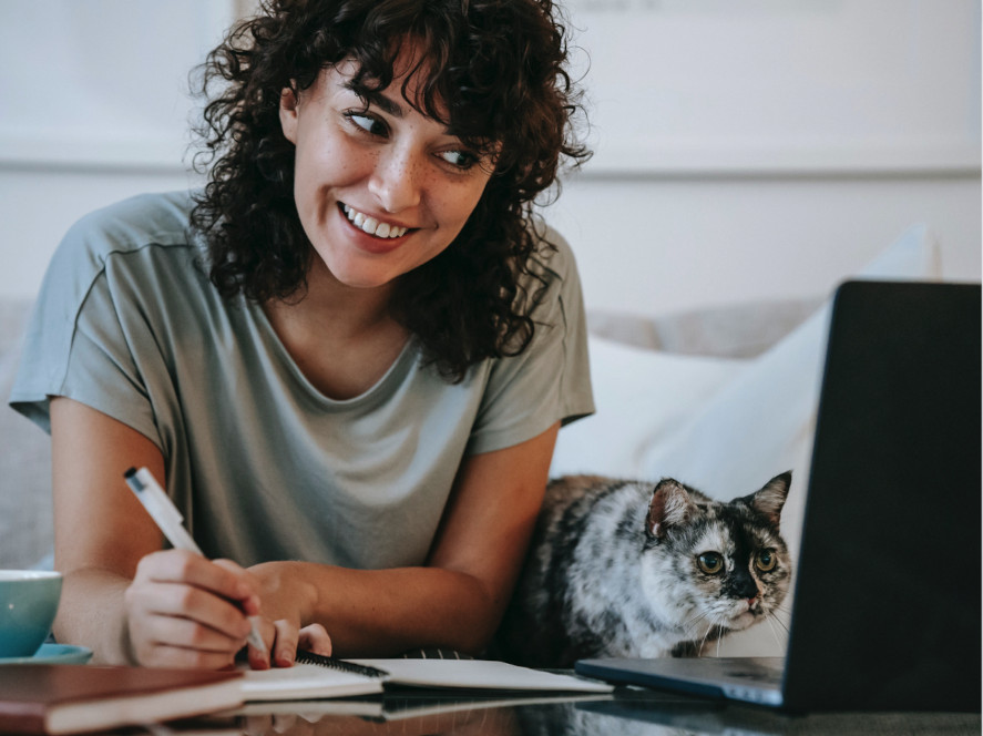 Woman comparing insurance for senior cat